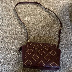 Michael Kors small plum colored handbag
